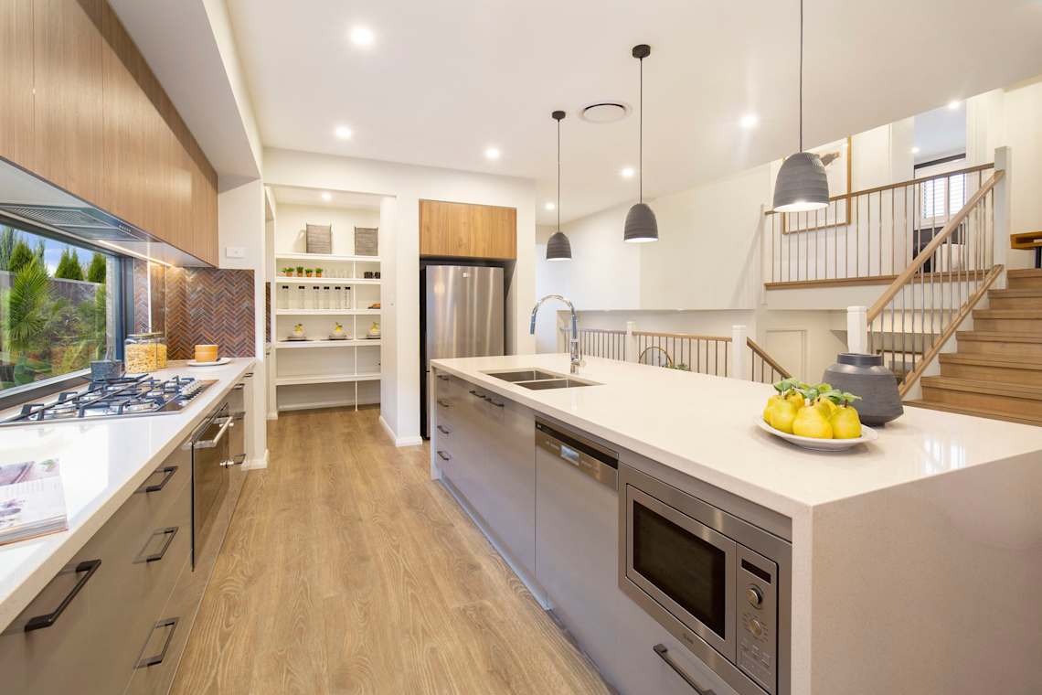 Trilogy house design kitchen staircase