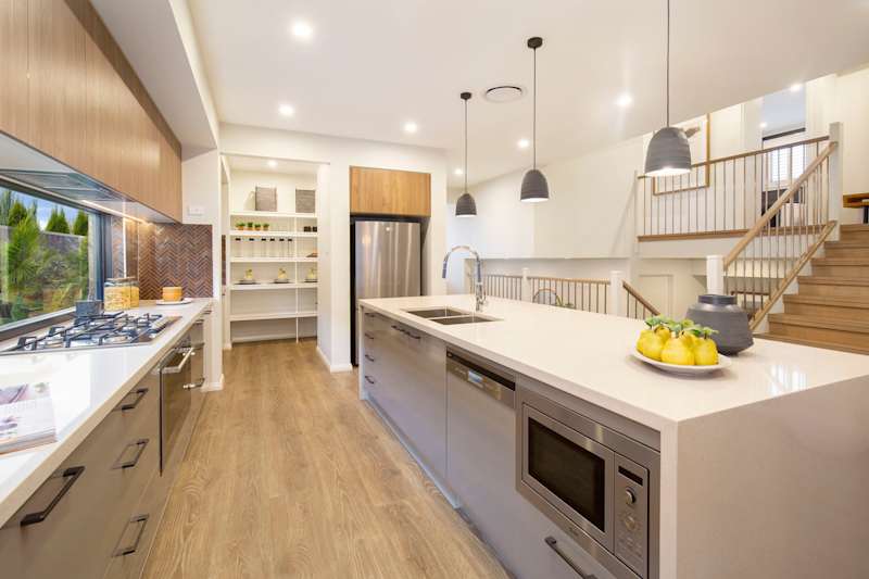 Trilogy house design kitchen staircase